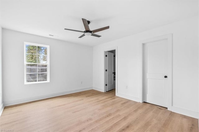 unfurnished bedroom with light wood-type flooring and ceiling fan