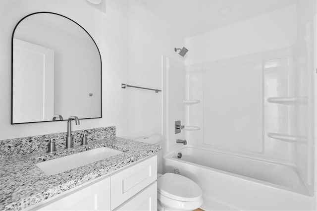 full bathroom featuring vanity, shower / bathtub combination, and toilet