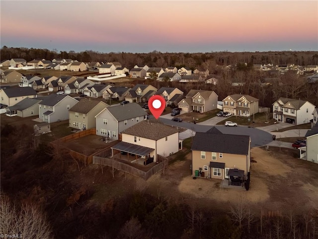 view of aerial view at dusk