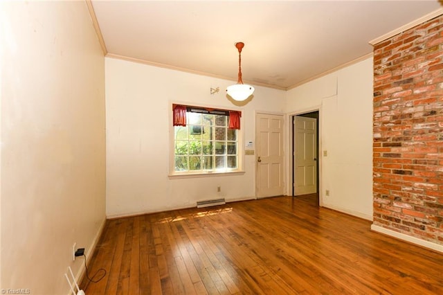 1300 Hobbs Rd, Greensboro, NC 27410 - unfurnished room featuring crown molding, hardwood / wood-style floors, and baseboards