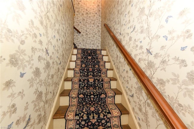1300 Hobbs Rd, Greensboro, NC 27410 - staircase featuring wallpapered walls and baseboards