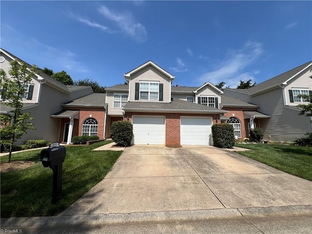 3931 Fountain Village Ln, High Point, NC 27265 - traditional-style home featuring brick siding, concrete driveway, a front lawn, and an attached garage