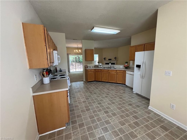 3931 Fountain Village Ln, High Point, NC 27265 - kitchen with white appliances, a chandelier, light countertops, a sink, and baseboards
