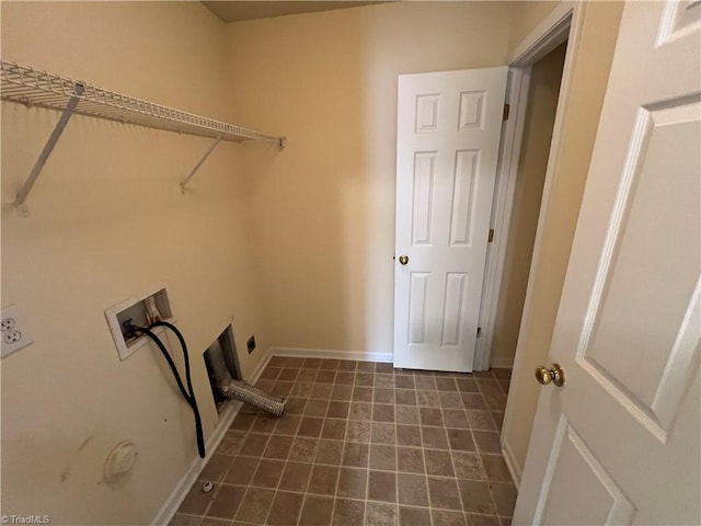 3931 Fountain Village Ln, High Point, NC 27265 - laundry area featuring washer hookup, dark tile patterned floors, and baseboards