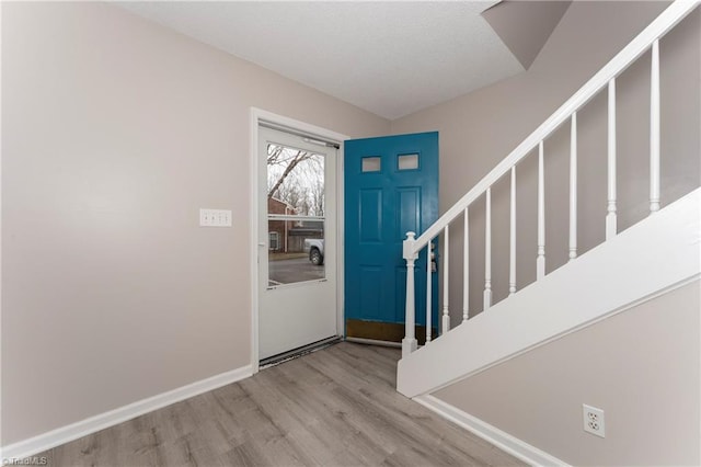 foyer entrance featuring light hardwood / wood-style flooring