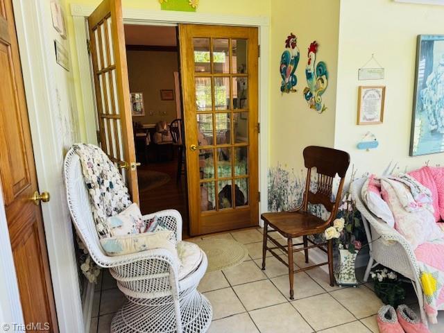 526 Bob Rainey Trl, Burlington, NC 27217 - living area with tile patterned floors and healthy amount of natural light