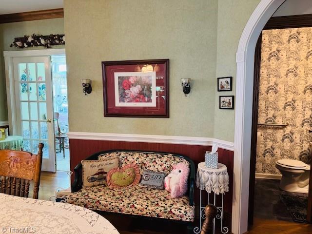 526 Bob Rainey Trl, Burlington, NC 27217 - bedroom with wood finished floors and arched walkways