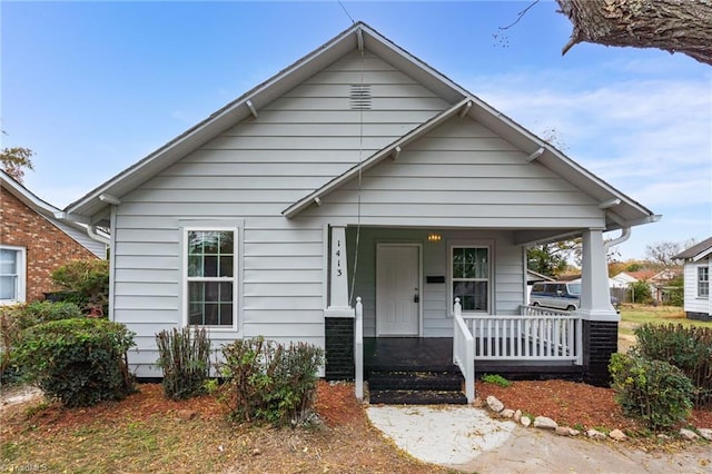 bungalow-style home with a porch