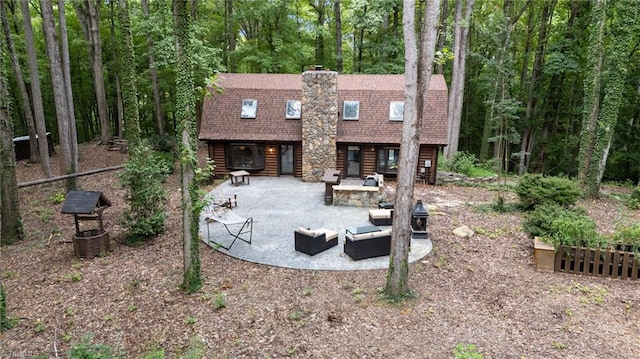 back of house with a patio area