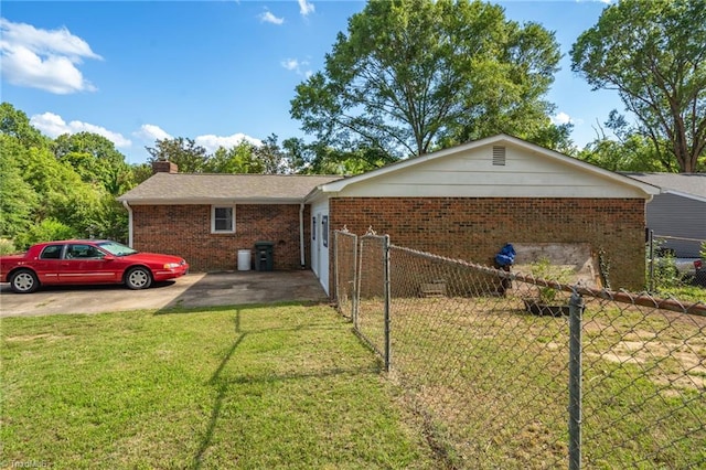 view of property exterior with a lawn