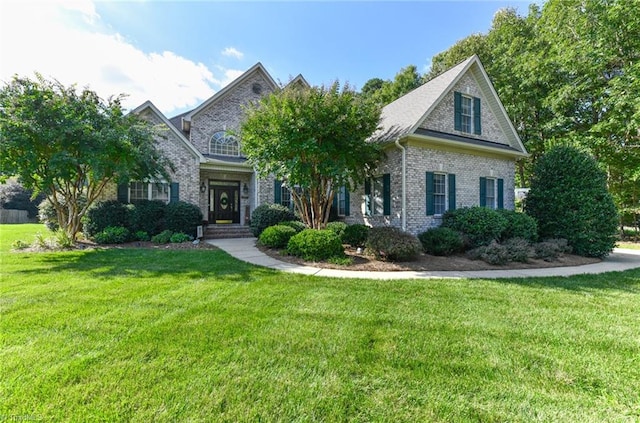 view of front of house with a front lawn