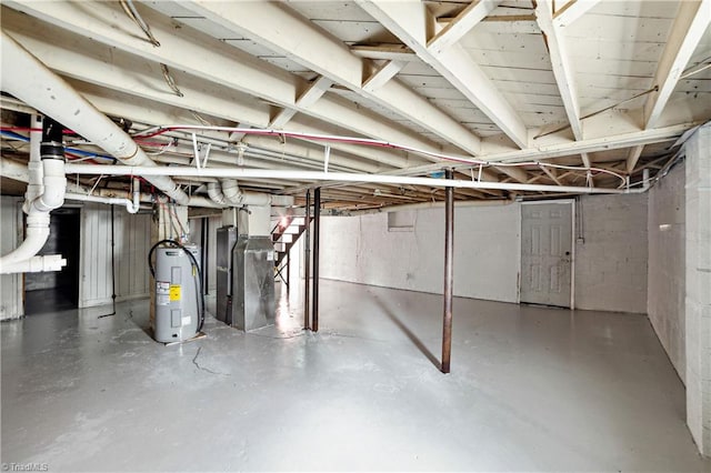 basement with heating unit and water heater