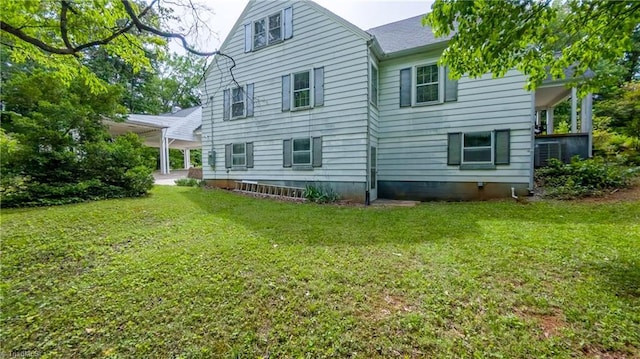 back of property with a yard