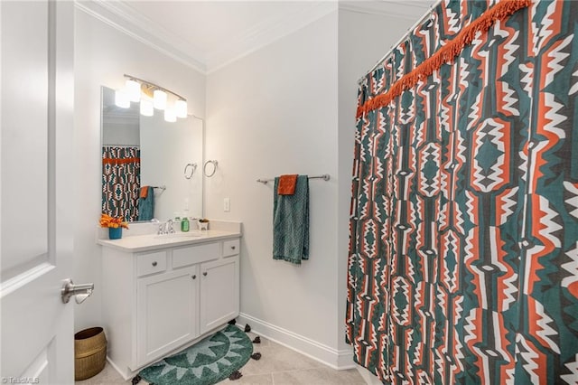 bathroom with crown molding, vanity, and tile patterned flooring