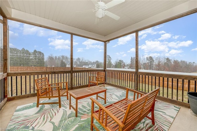 sunroom / solarium with ceiling fan