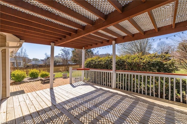 wooden deck with fence and a pergola