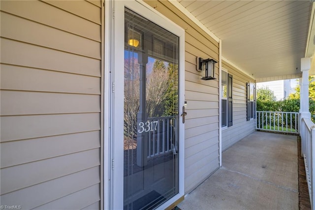 entrance to property with a porch