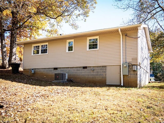 back of property with central air condition unit