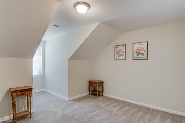 1438 Crestlawn Trl, Pfafftown, NC 27040 - bonus room with vaulted ceiling, carpet, and baseboards