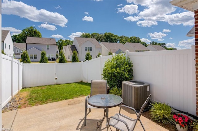 1438 Crestlawn Trl, Pfafftown, NC 27040 - fenced backyard featuring a patio area, a residential view, and central air condition unit
