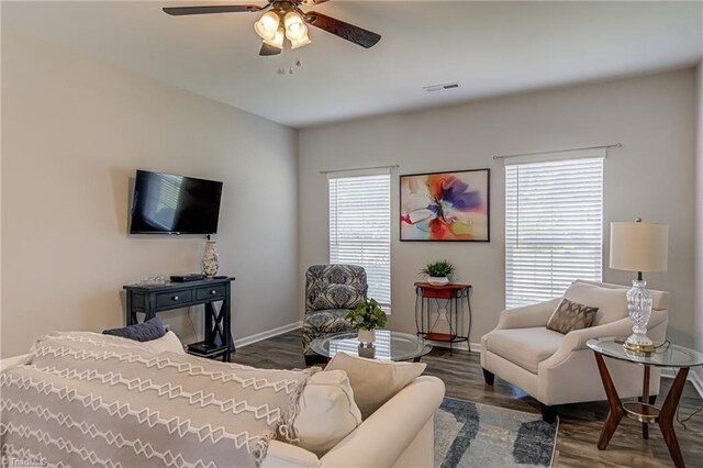 1438 Crestlawn Trl, Pfafftown, NC 27040 - living room with ceiling fan, healthy amount of natural light, baseboards, and wood finished floors