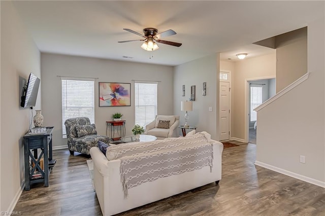 1438 Crestlawn Trl, Pfafftown, NC 27040 - living area with a ceiling fan, plenty of natural light, dark wood-style floors, and baseboards