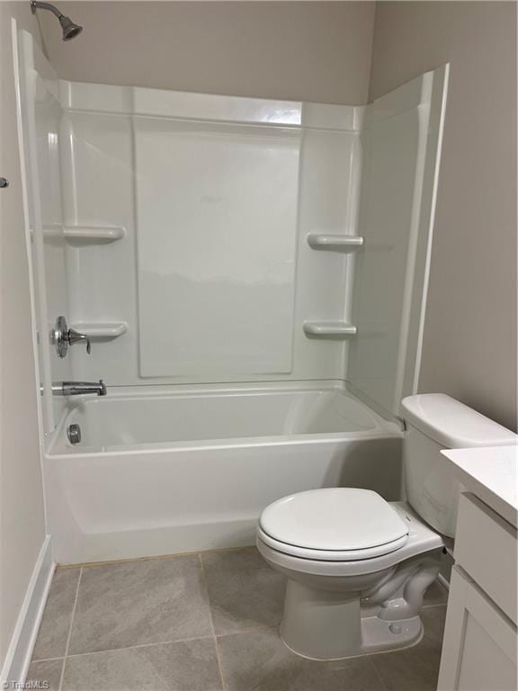 full bathroom with tile patterned flooring, toilet, vanity, and bathing tub / shower combination