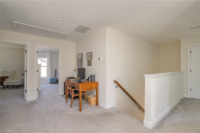 home office featuring light colored carpet