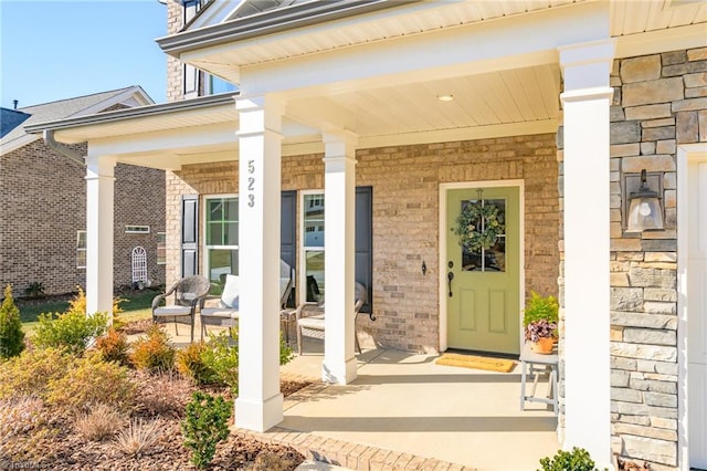 property entrance featuring covered porch