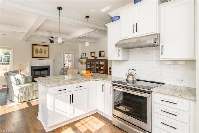 kitchen featuring kitchen peninsula, pendant lighting, stainless steel electric range oven, white cabinetry, and beamed ceiling