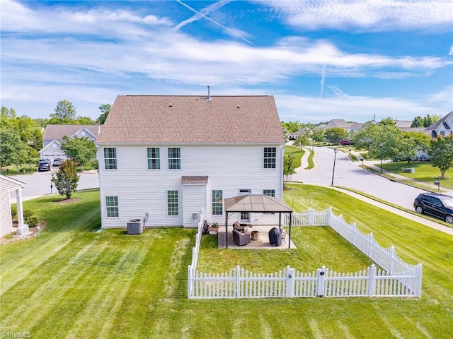 rear view of house with a gazebo, cooling unit, a patio, and an outdoor hangout area