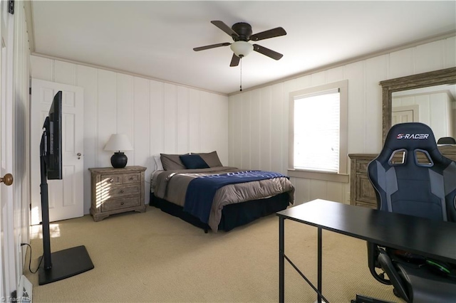 bedroom with light carpet and ceiling fan