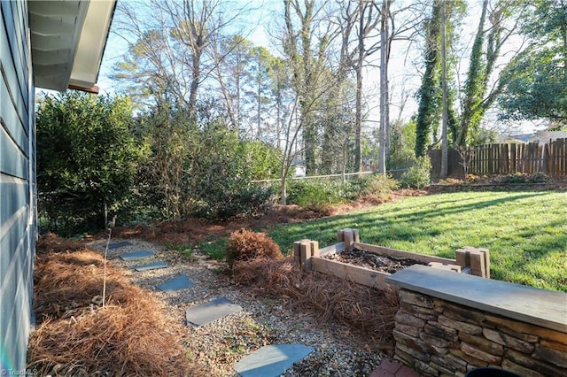 view of yard featuring fence