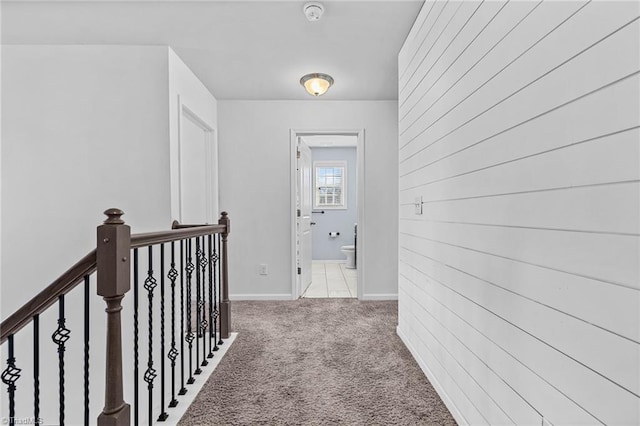 hallway with light carpet