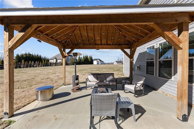 view of patio with an outdoor hangout area and a gazebo