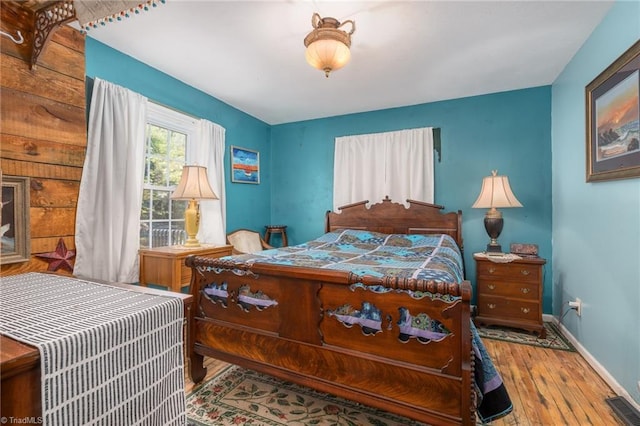 238 Maple St, King, NC 27021 - bedroom featuring hardwood / wood-style floors and baseboards