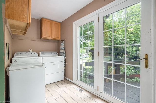 238 Maple St, King, NC 27021 - laundry room with cabinet space and independent washer and dryer