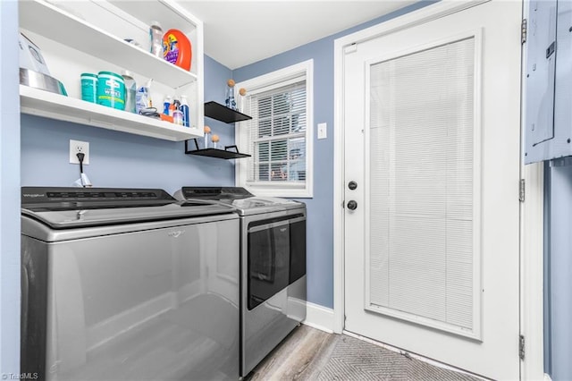 4814 Merrimac St, Winston-Salem, NC 27105 - laundry room with washing machine and clothes dryer and wood finished floors