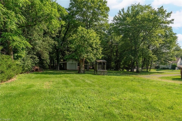 4814 Merrimac St, Winston-Salem, NC 27105 - view of green lawn featuring a gazebo and a storage shed