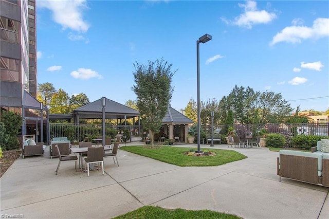 view of patio with a gazebo and outdoor lounge area