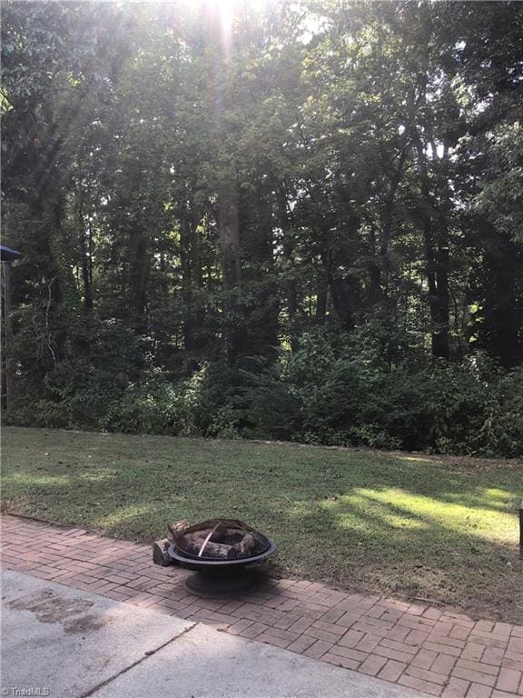 view of patio / terrace featuring a fire pit