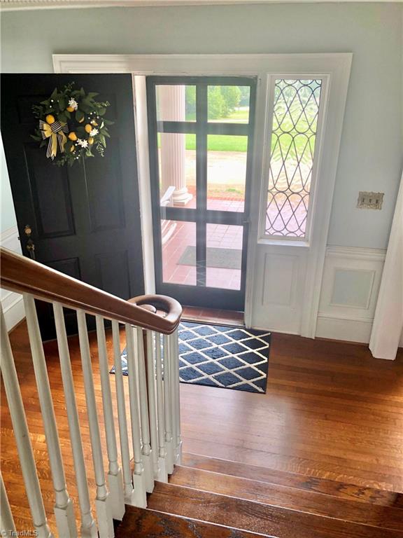 entrance foyer with hardwood / wood-style floors