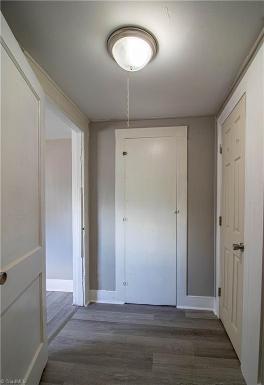 hall featuring dark hardwood / wood-style flooring