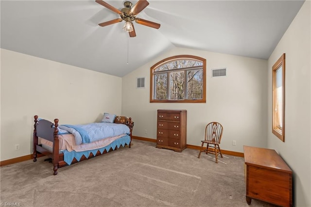 bedroom featuring lofted ceiling, carpet floors, baseboards, and visible vents