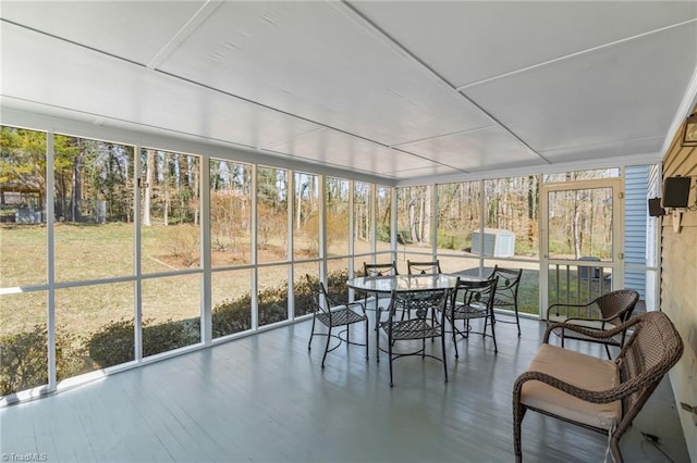 unfurnished sunroom with a wealth of natural light