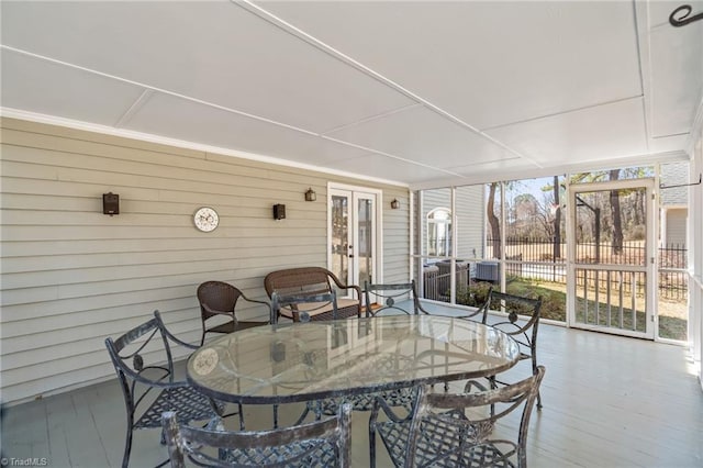 sunroom / solarium with a healthy amount of sunlight