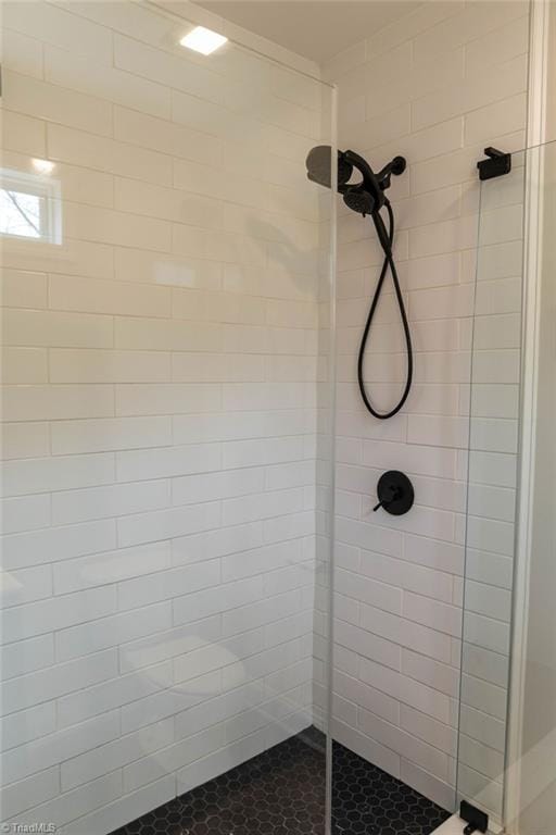 bathroom featuring walk in shower