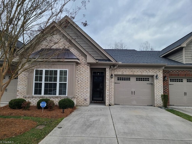 view of front of property featuring a garage