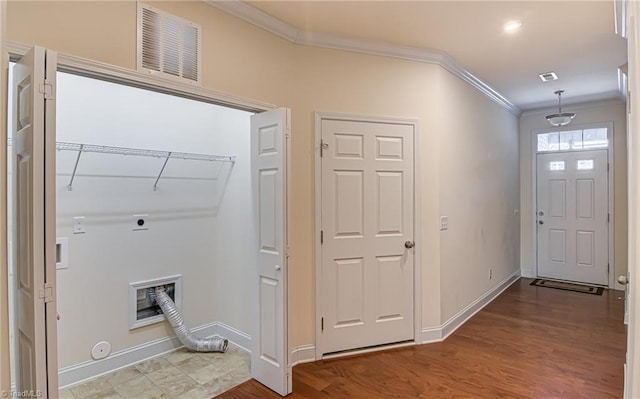 laundry room with hookup for an electric dryer, hookup for a gas dryer, hookup for a washing machine, hardwood / wood-style flooring, and ornamental molding