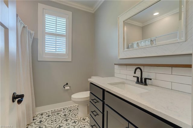 bathroom featuring baseboards, ornamental molding, tile patterned flooring, toilet, and backsplash